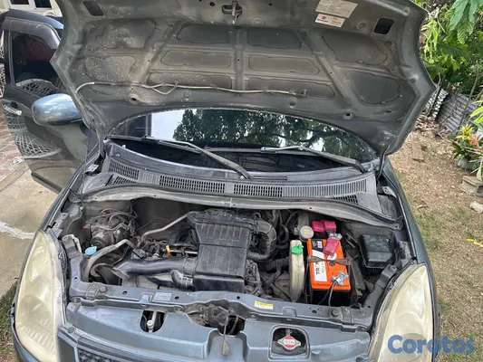 2009 Suzuki Swift — foto 8 / 9