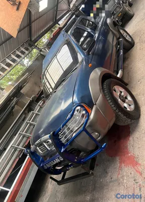 2006 Nissan Frontier — foto 6 / 7