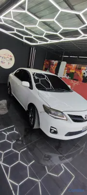 2013 Toyota Corolla — foto 14 / 16