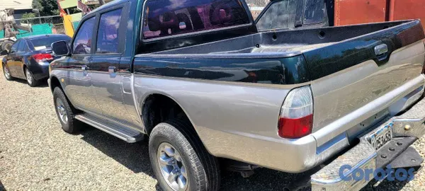 2002 Mitsubishi L200 — foto 5 / 6