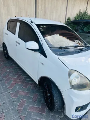 2015 Daihatsu Mira — foto 14 / 16