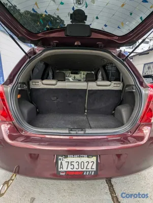2011 Toyota Vitz — foto 13 / 15