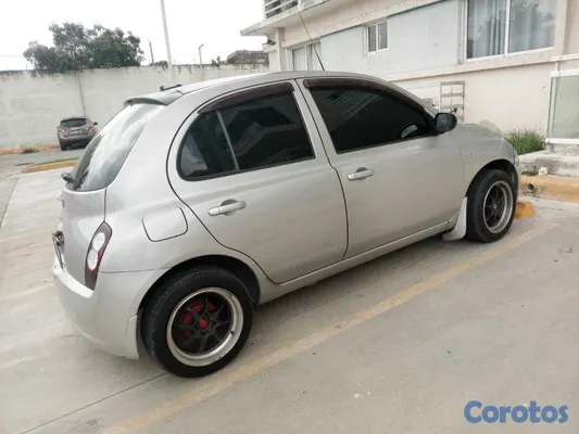 2010 Nissan March — foto 7 / 9