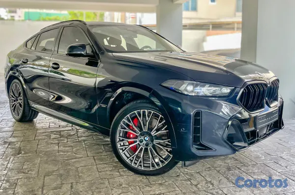 2026 BMW X 6 M60i — foto 4 / 12