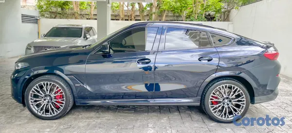 2026 BMW X 6 M60i — foto 6 / 12