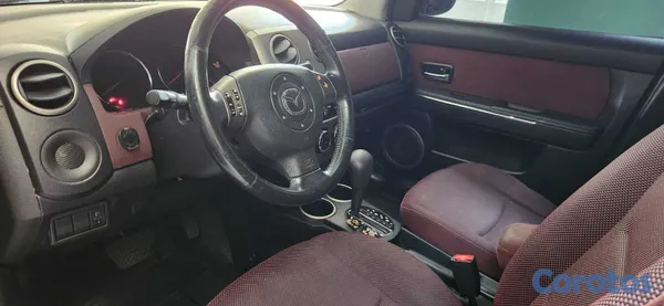 2010 Mazda Verisa — foto 4 / 7