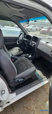 2011 Nissan Frontier — foto 3 / 8