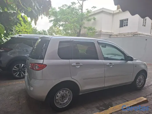 2007 Mazda Demio — foto 7 / 9