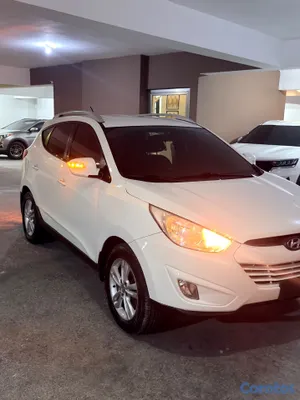 2013 Hyundai Tucson — foto 11 / 12