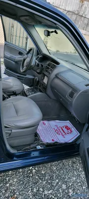 2002 Chevrolet Tracker — foto 6 / 9