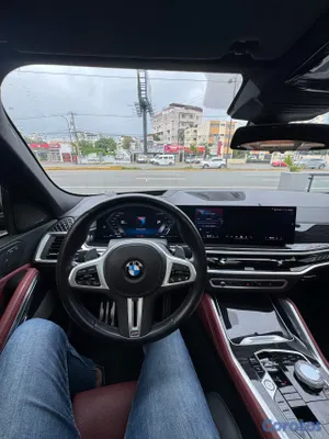 2024 BMW X-6 M60I — foto 10 / 13