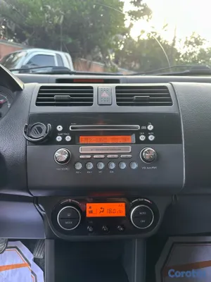 2011 Suzuki Swift — foto 4 / 10