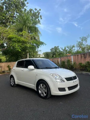 2011 Suzuki Swift — foto 9 / 10