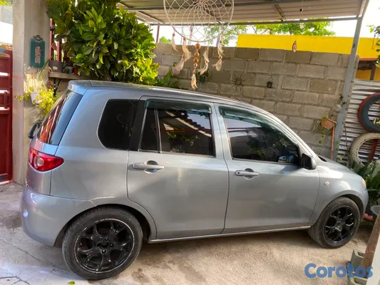 2005 Mazda Demio — foto 3 / 6
