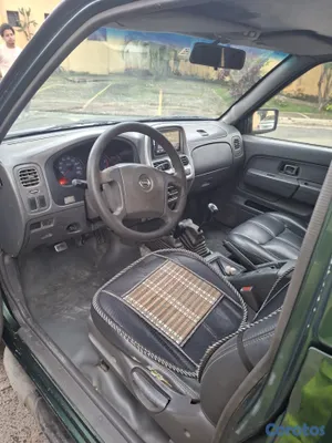 2004 Nissan Frontier — foto 7 / 12