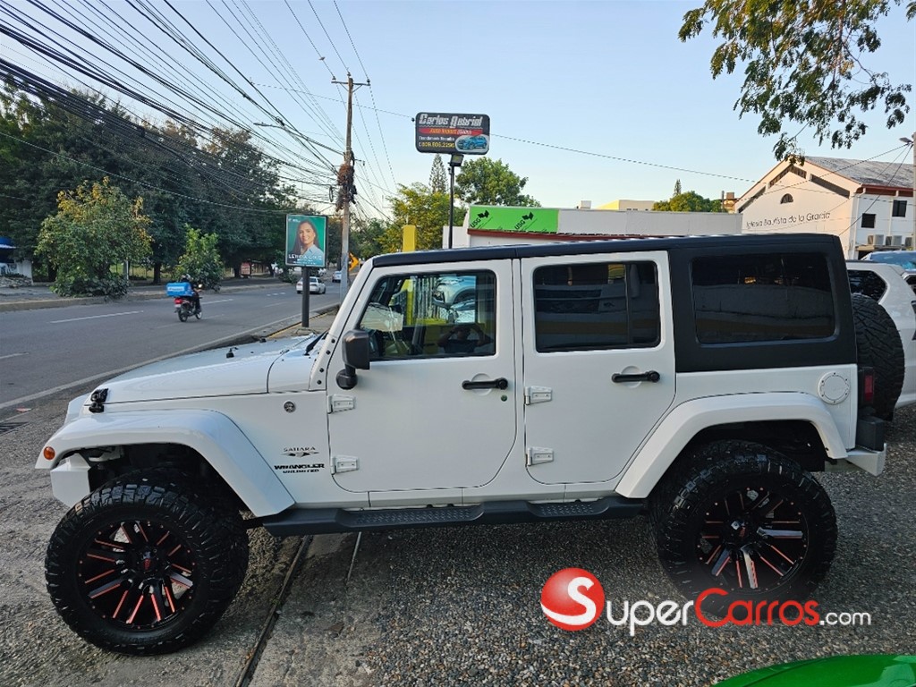 2016 Jeep Wrangler Sahara Unlimited — foto 11 / 12