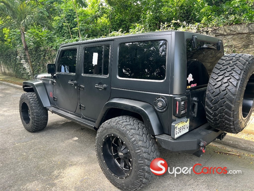 2012 Jeep Wrangler Unlimited Sahara — foto 4 / 11