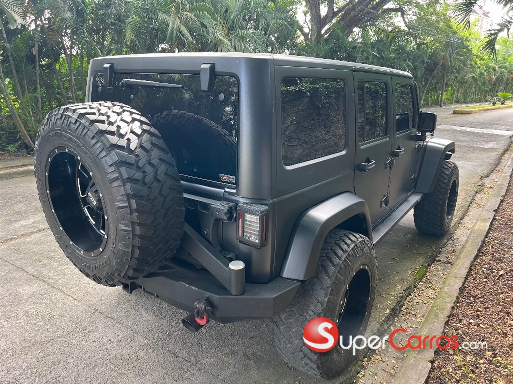 2012 Jeep Wrangler Unlimited Sahara — foto 6 / 11