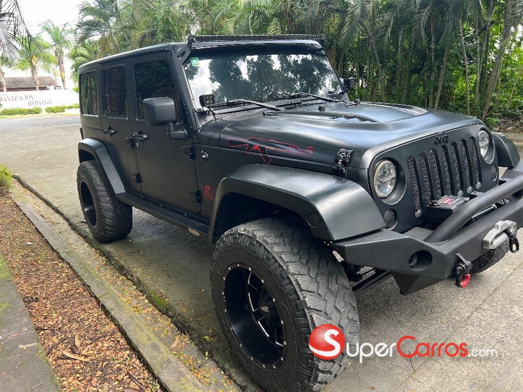 2012 Jeep Wrangler Unlimited Sahara — foto 9 / 11