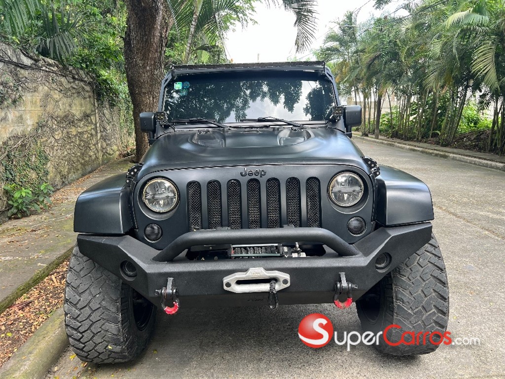 2012 Jeep Wrangler Unlimited Sahara — foto 10 / 11