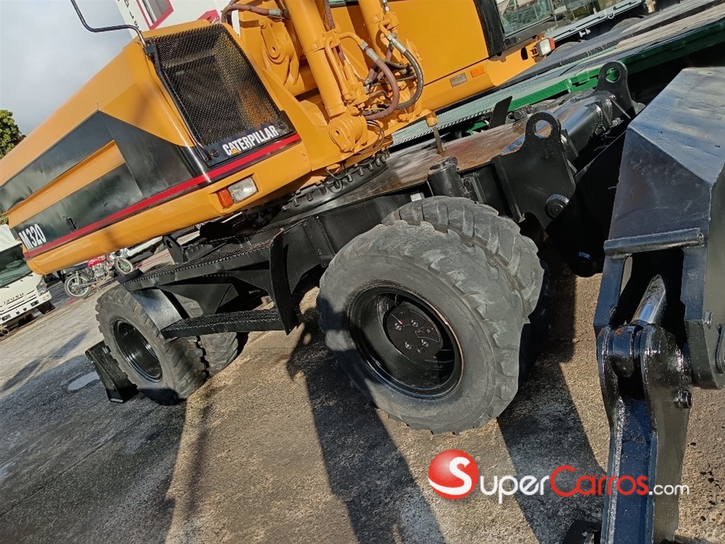 2002 Caterpillar 320D — foto 4 / 12