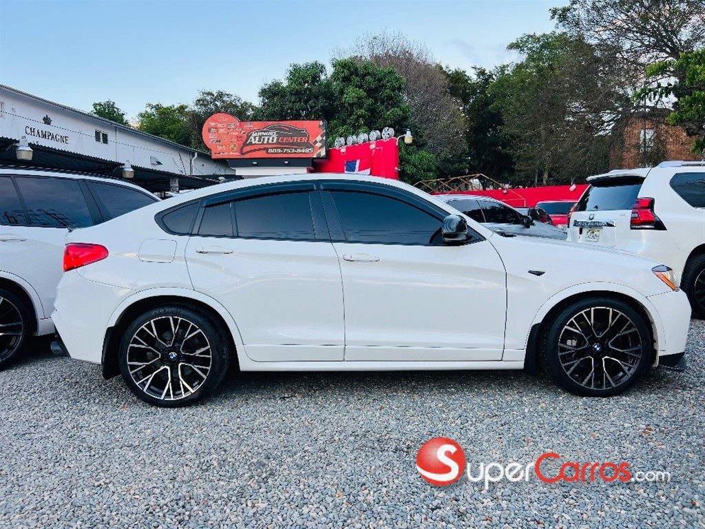 2017 BMW X 4 M40i — foto 6 / 12