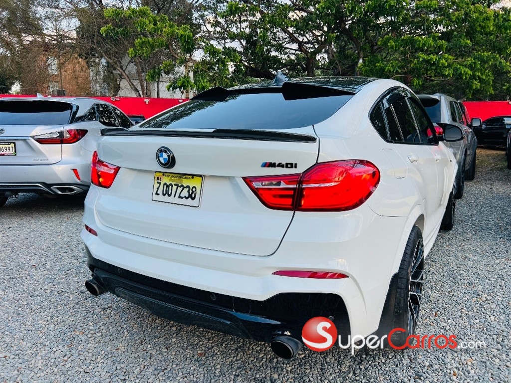 2017 BMW X 4 M40i — foto 8 / 12