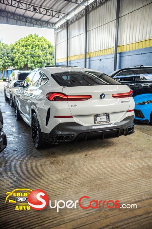 2024 BMW X 6 M60i — foto 4 / 12
