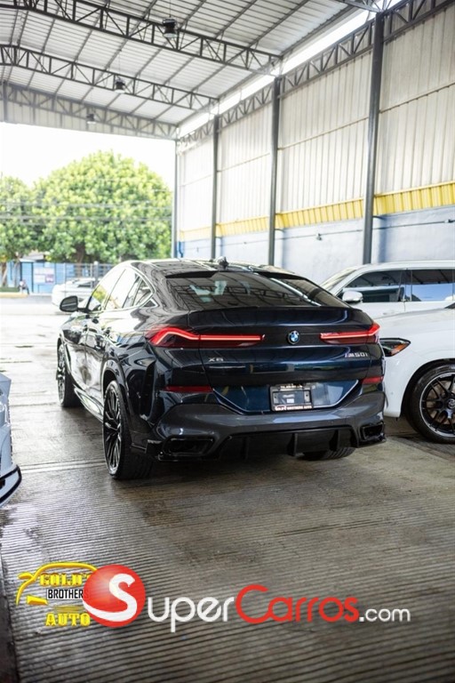 2022 BMW X 6 M50i — foto 4 / 12