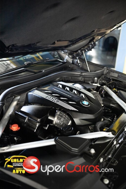 2022 BMW X 6 M50i — foto 12 / 12