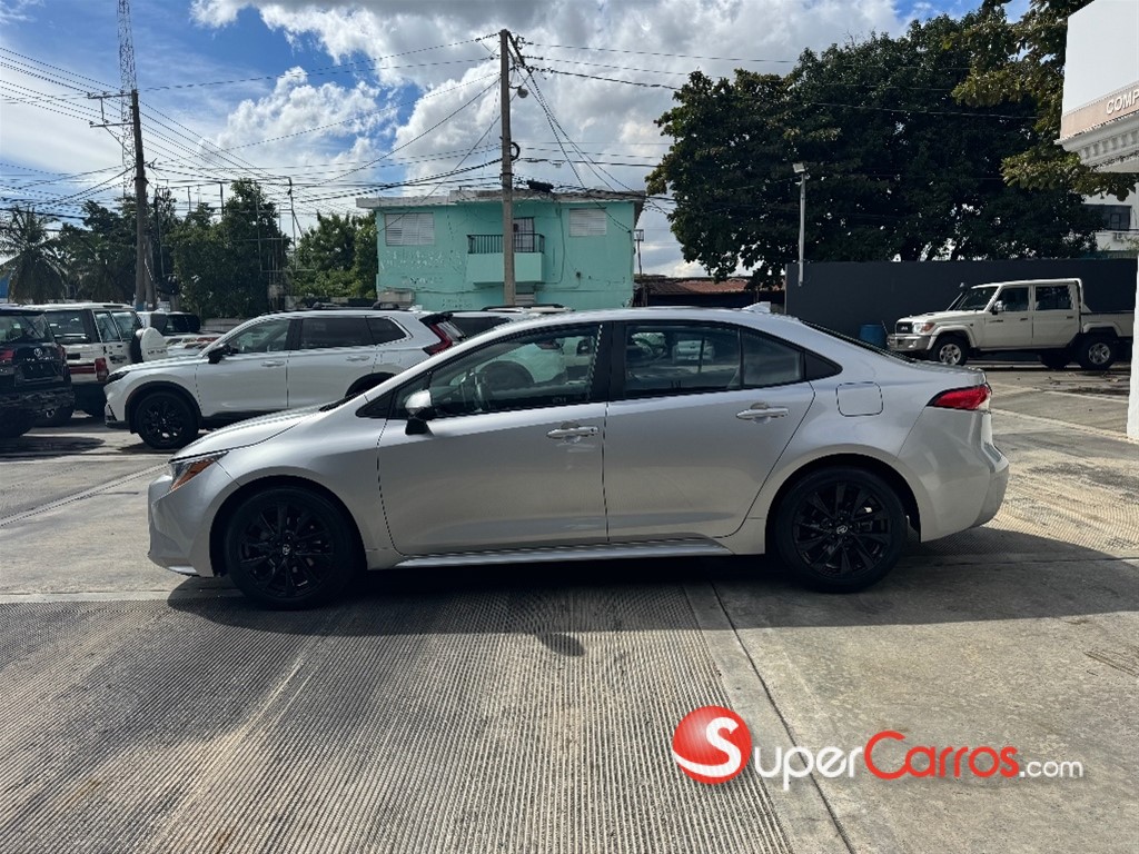 2021 Toyota Corolla LE — foto 6 / 9