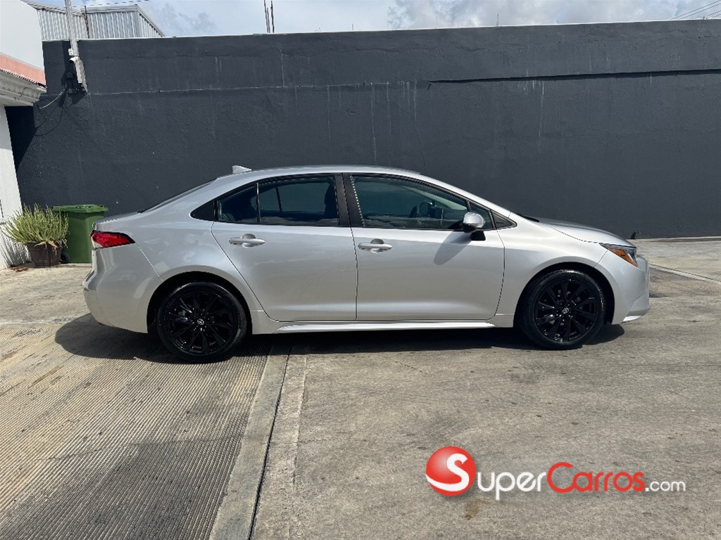 2021 Toyota Corolla LE — foto 7 / 9