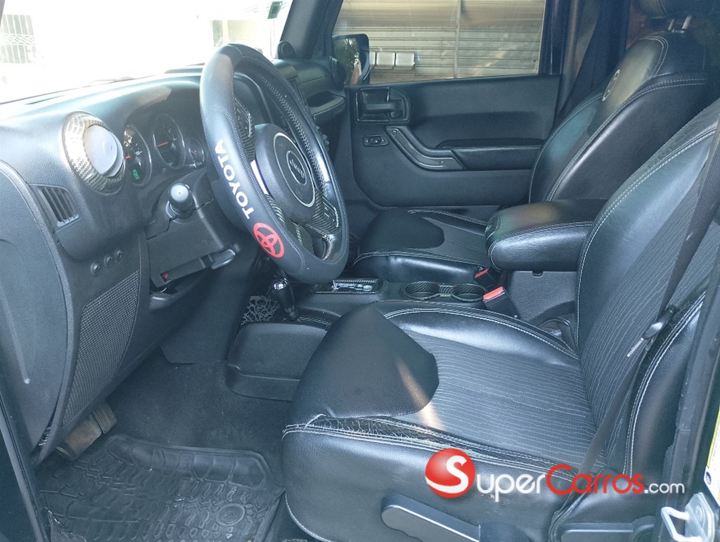 2014 Jeep Wrangler Sahara — foto 10 / 11