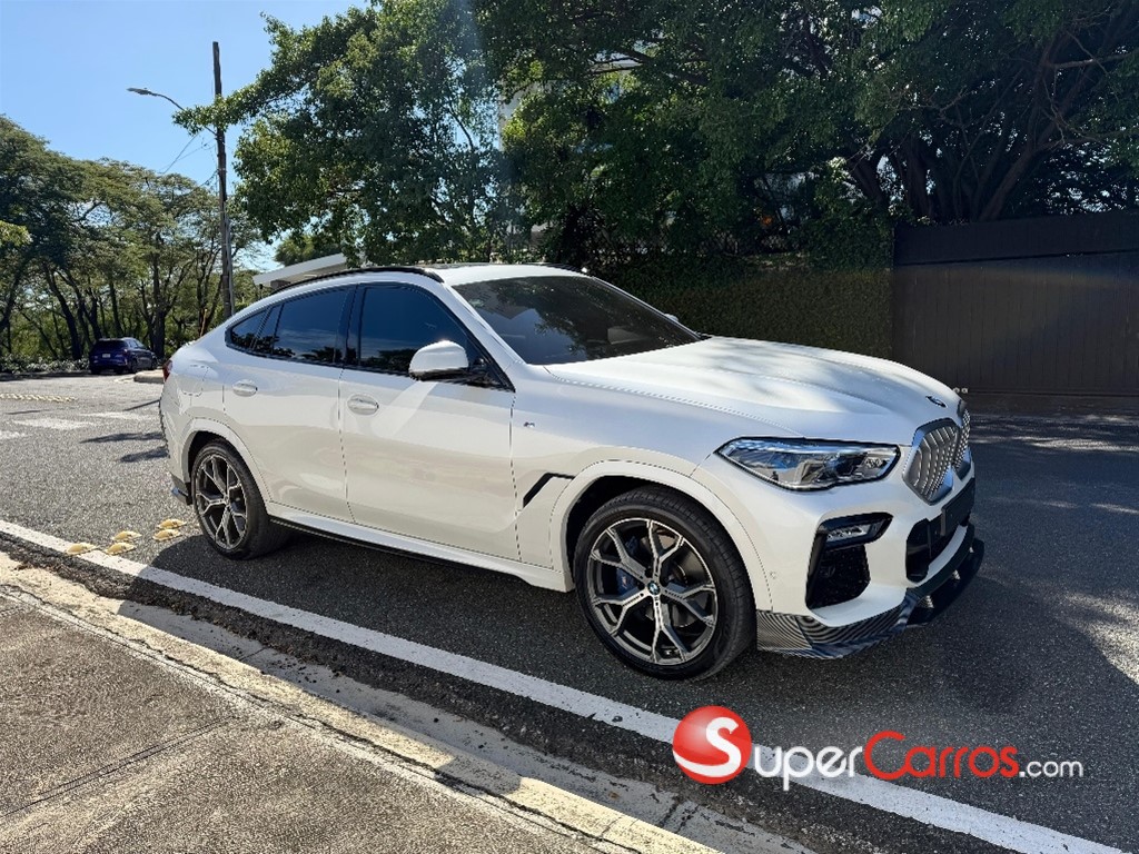2021 BMW X 6 xDrive40i — foto 4 / 9