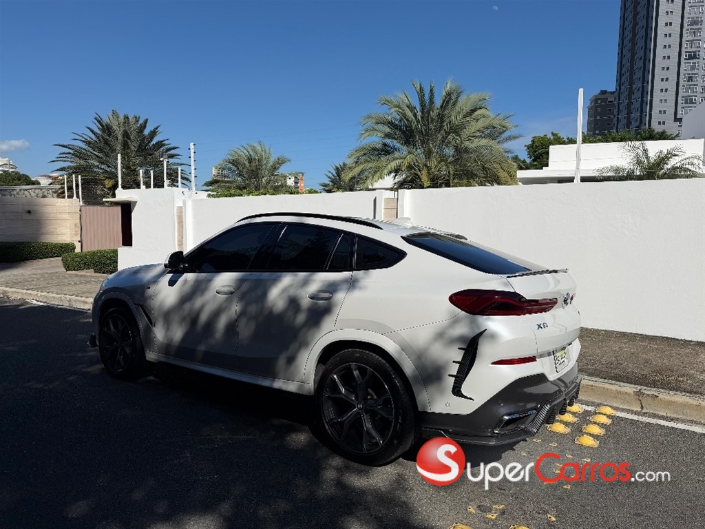 2021 BMW X 6 xDrive40i — foto 7 / 9