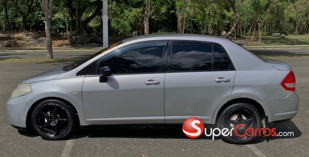 2013 Nissan TIIDA — foto 11 / 12