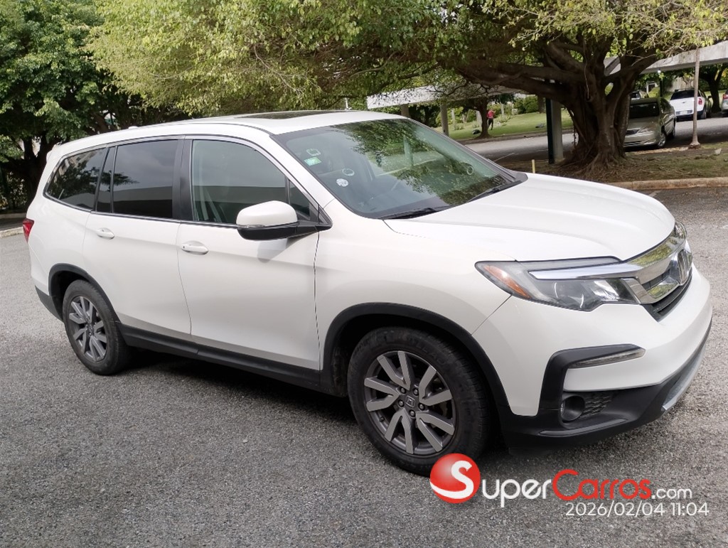 2021 Honda Pilot LX — foto 8 / 12