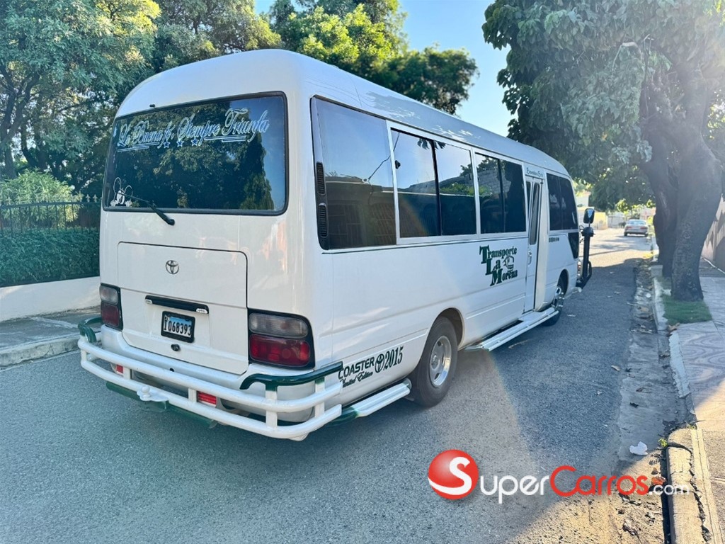 2015 Toyota Coaster — foto 7 / 8