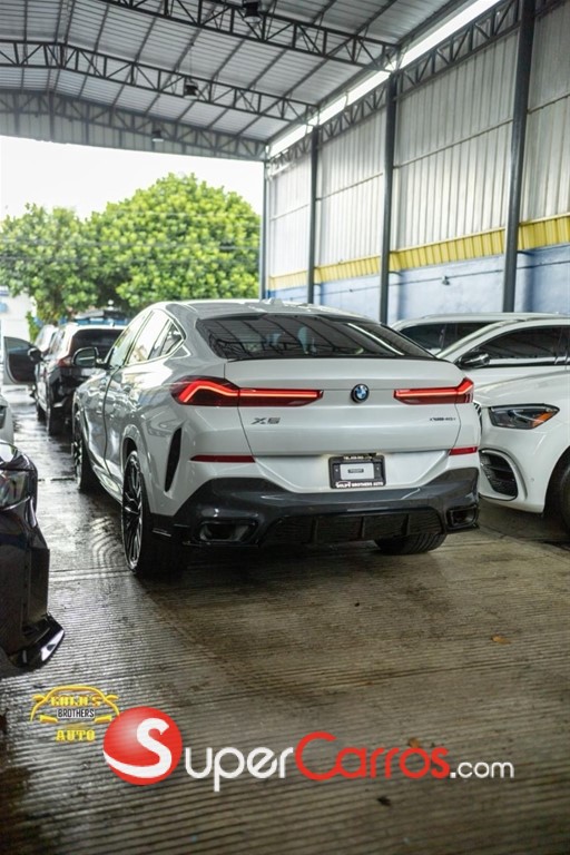 2024 BMW X 6 xDrive40i — foto 4 / 12