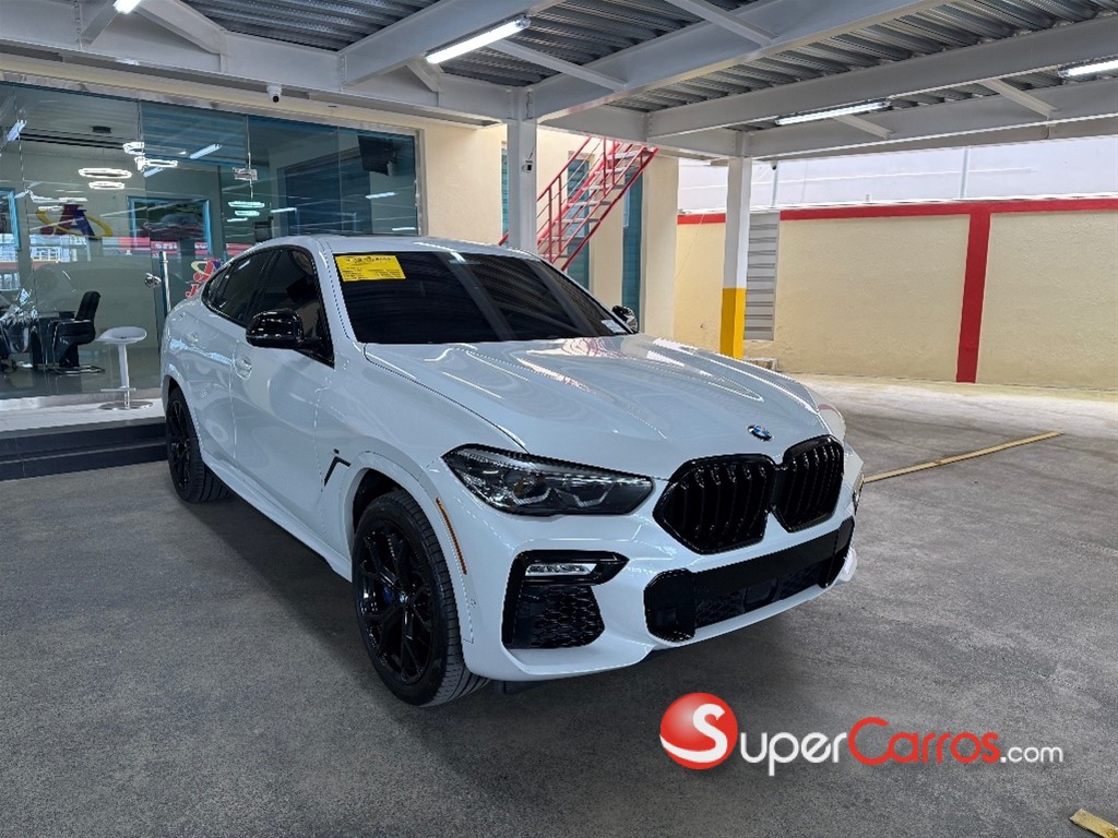 2020 BMW X 6 M50i — foto 3 / 12