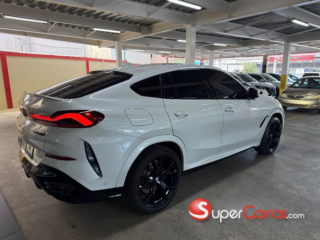 2020 BMW X 6 M50i — foto 5 / 12