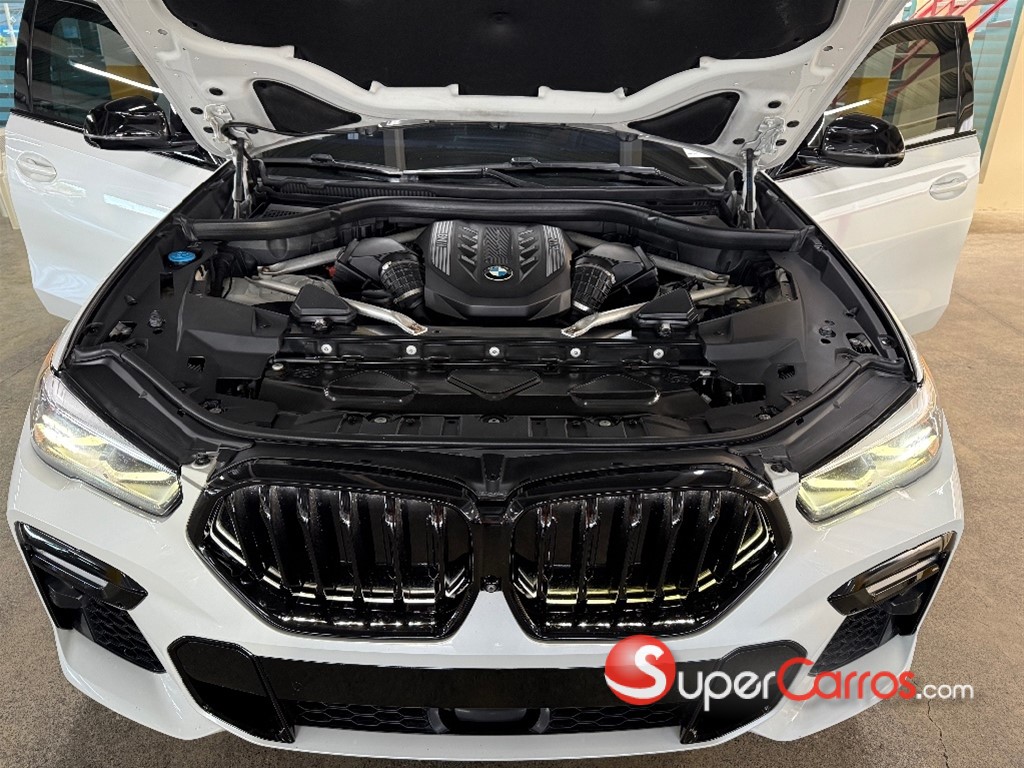 2020 BMW X 6 M50i — foto 7 / 12