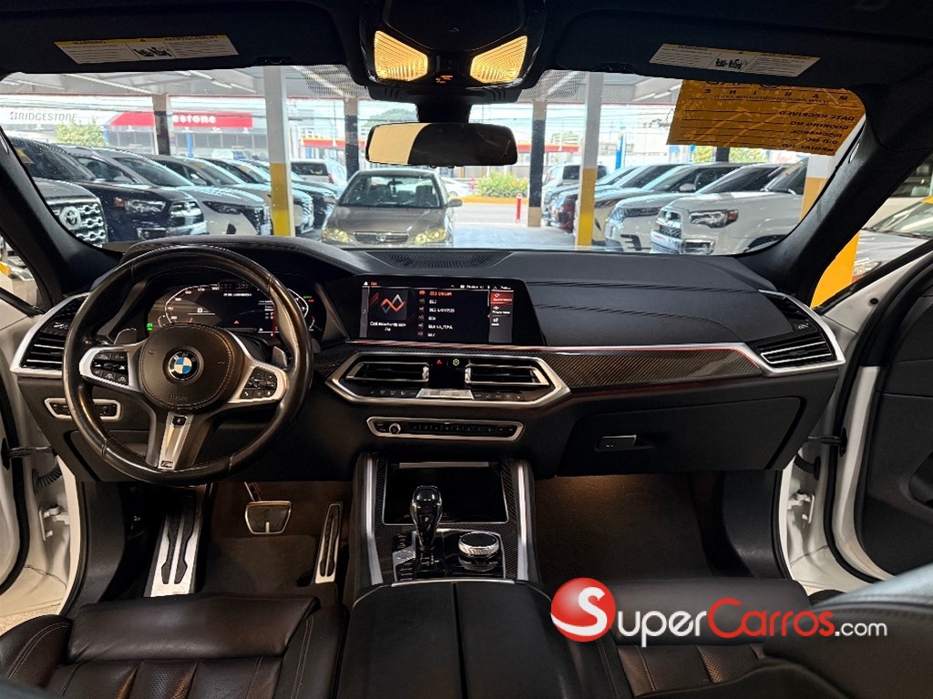 2020 BMW X 6 M50i — foto 8 / 12
