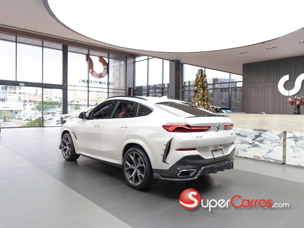 2021 BMW X 6 xDrive40i — foto 6 / 11