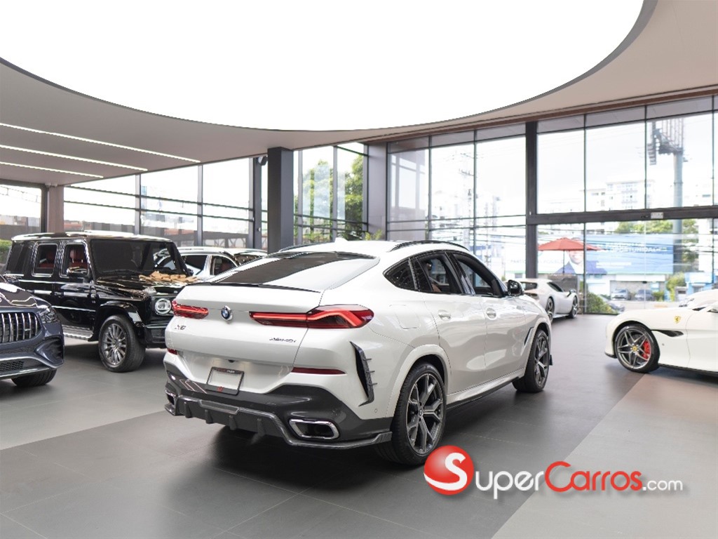2021 BMW X 6 xDrive40i — foto 7 / 11