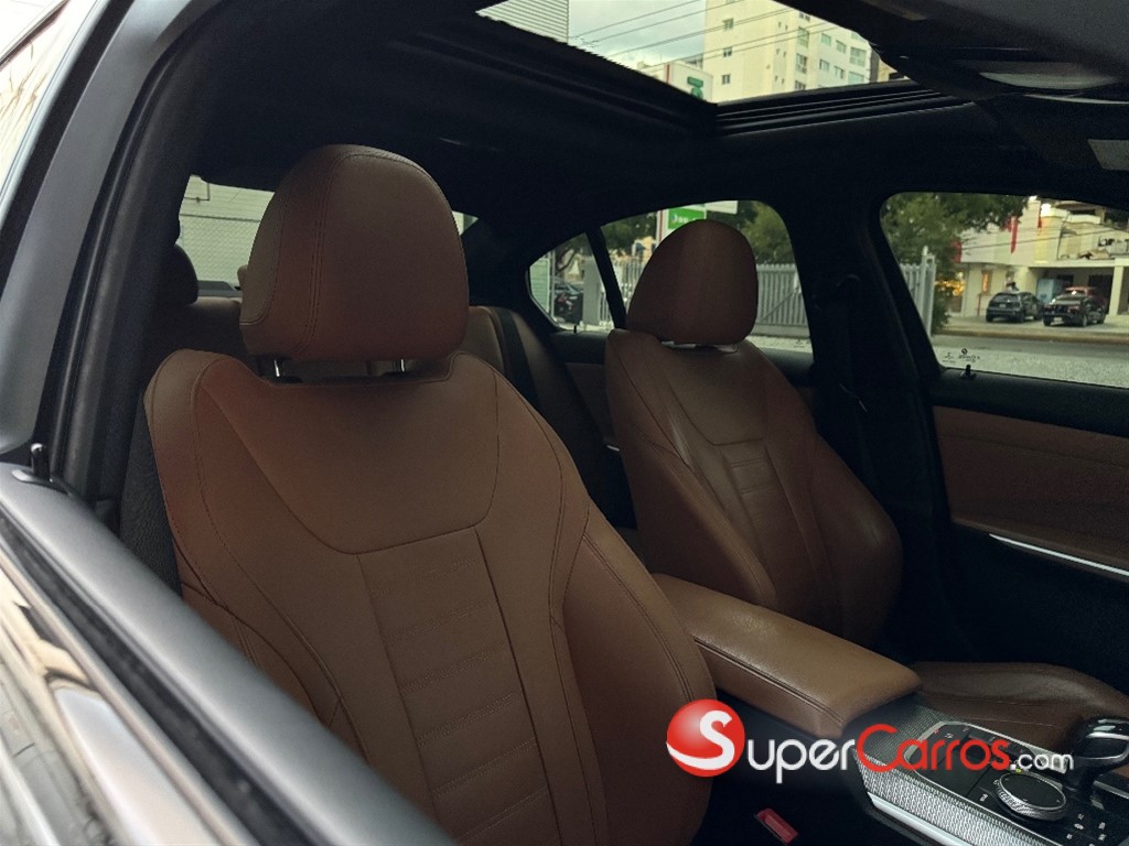 2021 BMW Serie 3 340i M — foto 8 / 12