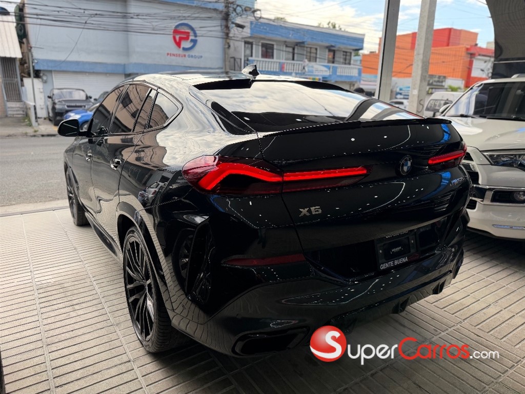2021 BMW X 6 M50i — foto 9 / 9