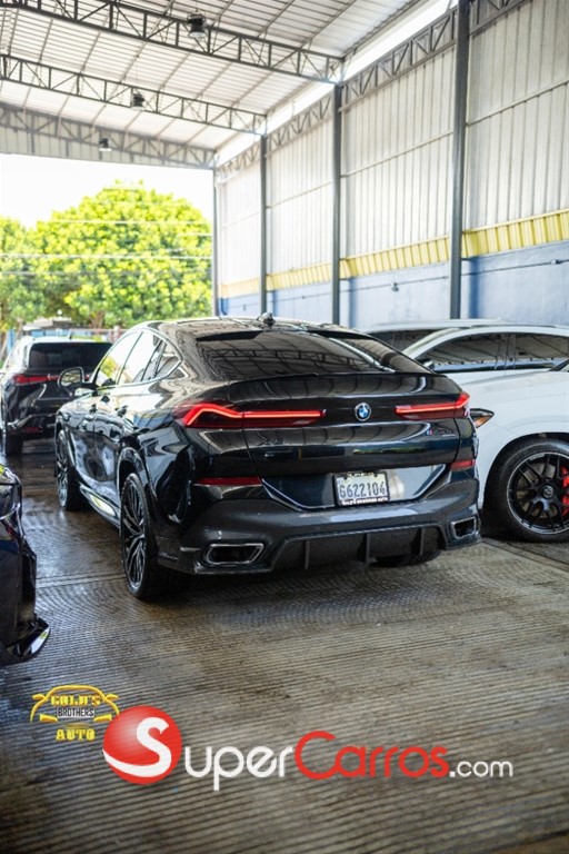 2021 BMW X 6 xDrive40i — foto 4 / 12