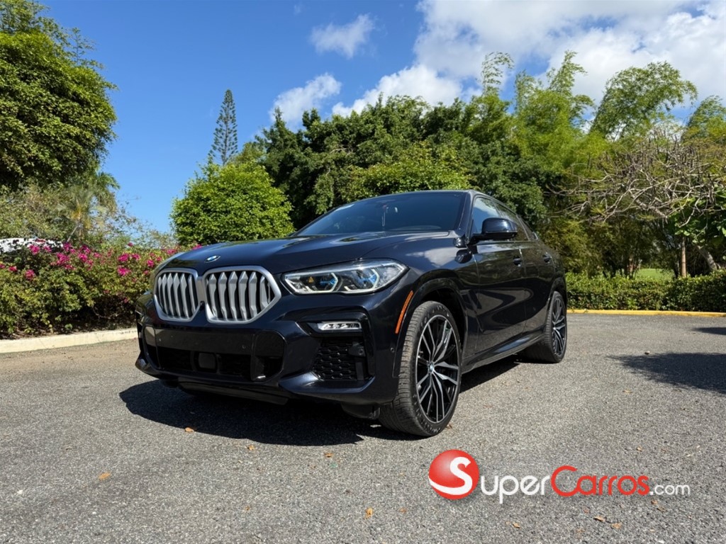 2021 BMW X 6 xDrive40i — foto 3 / 11