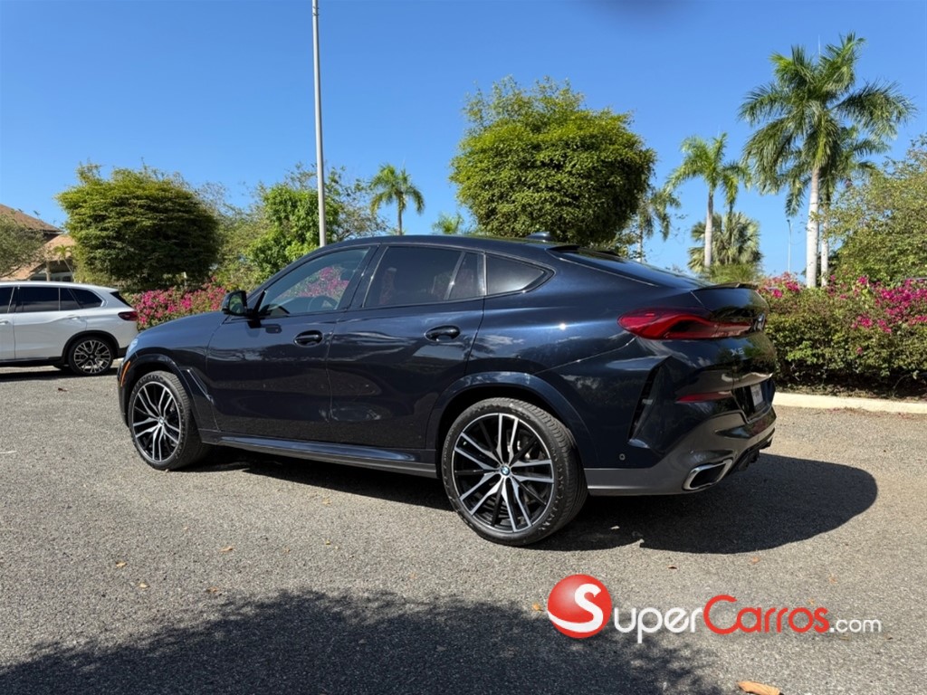 2021 BMW X 6 xDrive40i — foto 4 / 11